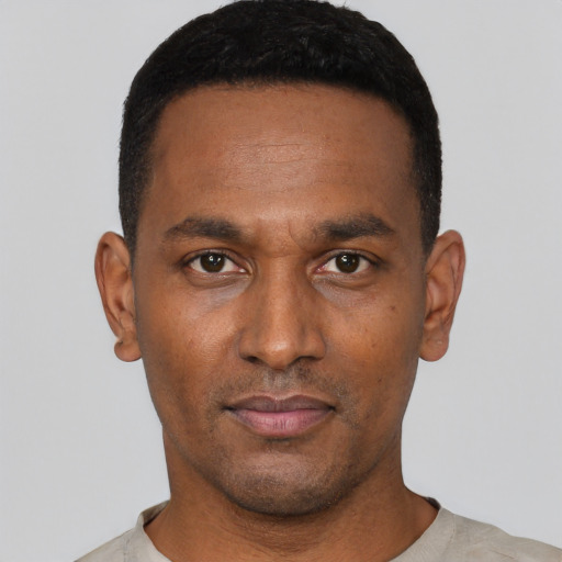 Neutral black young-adult male with short  black hair and brown eyes