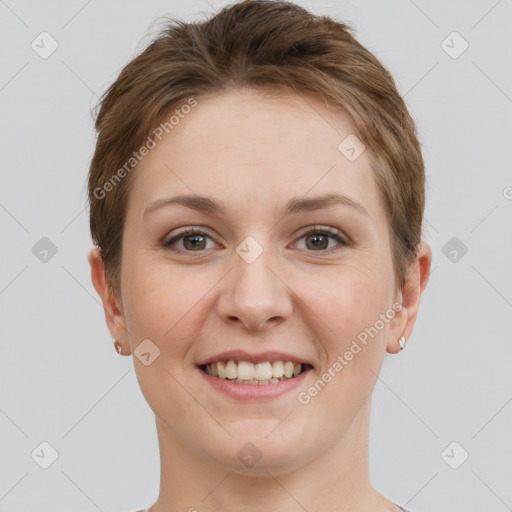 Joyful white young-adult female with short  brown hair and grey eyes