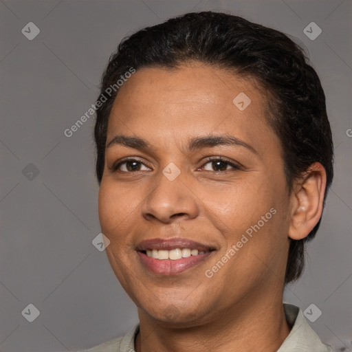 Joyful white adult female with short  brown hair and brown eyes