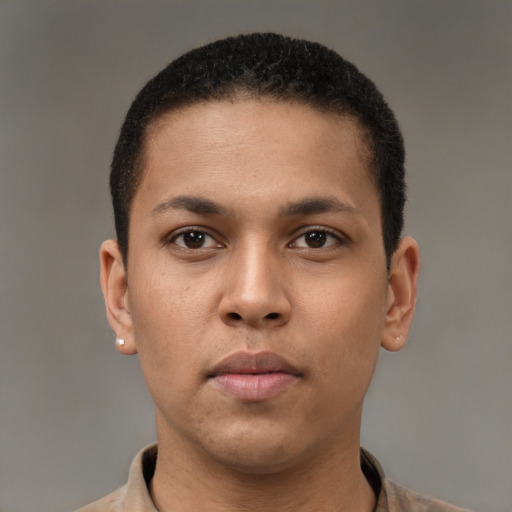 Neutral latino young-adult male with short  brown hair and brown eyes