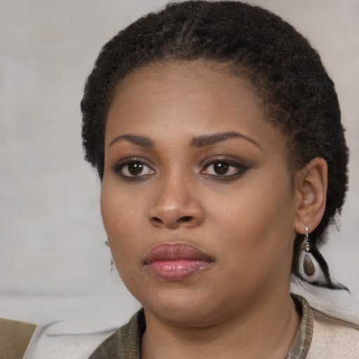 Neutral black young-adult female with short  black hair and brown eyes