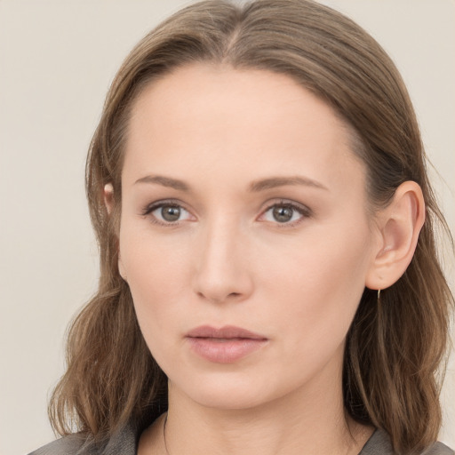 Neutral white young-adult female with long  brown hair and grey eyes