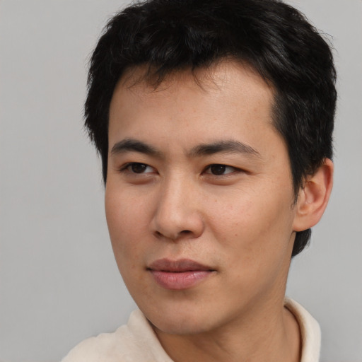 Neutral asian young-adult male with short  brown hair and brown eyes