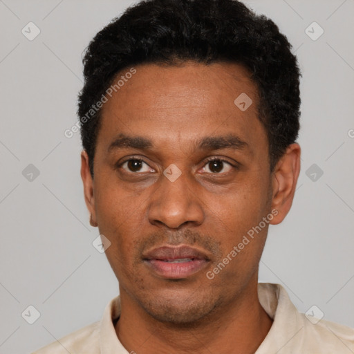 Neutral latino adult male with short  black hair and brown eyes