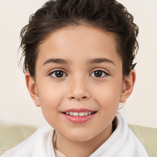 Joyful white child female with short  brown hair and brown eyes