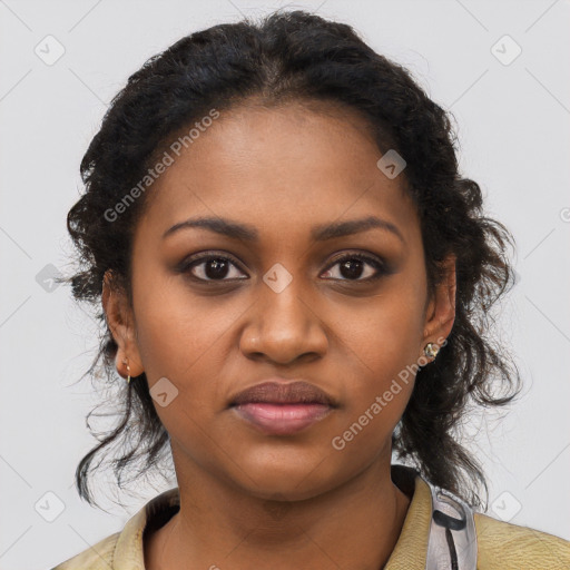 Joyful black young-adult female with medium  brown hair and brown eyes