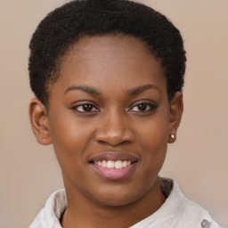 Joyful black young-adult female with short  brown hair and brown eyes