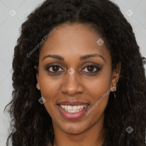 Joyful black young-adult female with long  brown hair and brown eyes