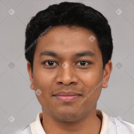 Joyful latino young-adult male with short  black hair and brown eyes