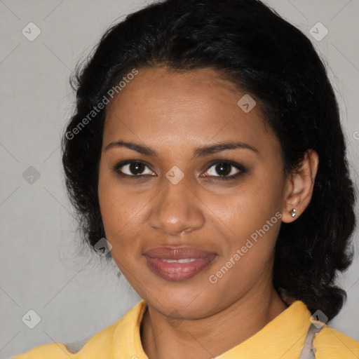 Joyful black young-adult female with medium  black hair and brown eyes