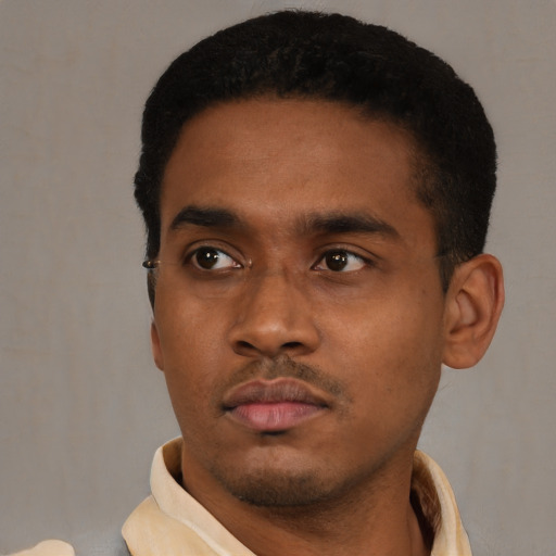 Neutral latino young-adult male with short  black hair and brown eyes