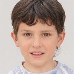 Joyful white child male with short  brown hair and brown eyes