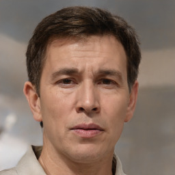 Neutral white adult male with short  brown hair and brown eyes