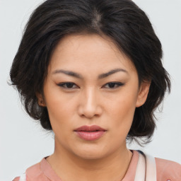 Neutral asian young-adult female with medium  brown hair and brown eyes