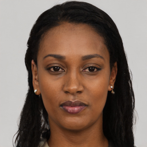 Neutral black young-adult female with long  black hair and brown eyes