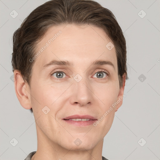 Joyful white adult male with short  brown hair and grey eyes