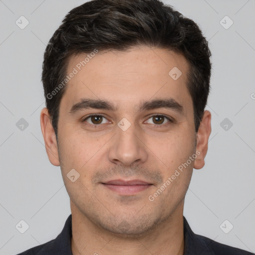 Joyful white young-adult male with short  black hair and brown eyes