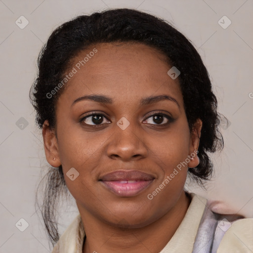 Joyful black young-adult female with medium  brown hair and brown eyes