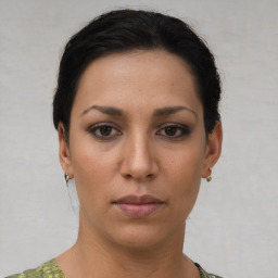 Neutral white young-adult female with short  brown hair and brown eyes