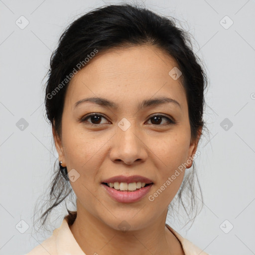 Joyful latino young-adult female with medium  brown hair and brown eyes