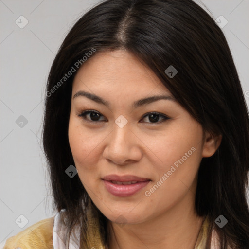 Joyful latino young-adult female with medium  brown hair and brown eyes