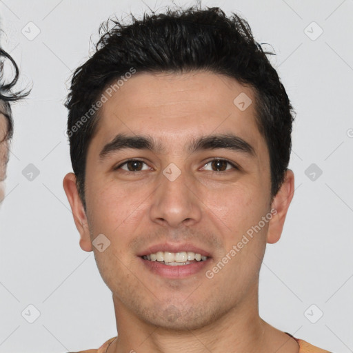 Joyful white young-adult male with short  black hair and brown eyes