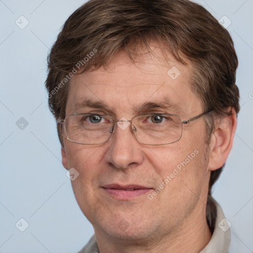 Joyful white middle-aged male with short  brown hair and grey eyes