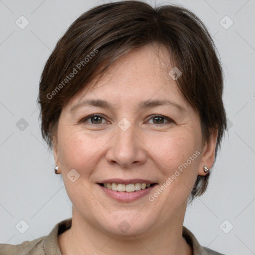 Joyful white adult female with medium  brown hair and brown eyes