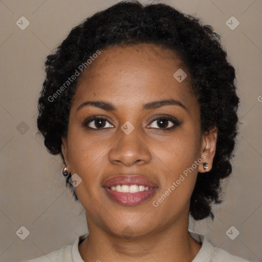 Joyful black young-adult female with medium  black hair and brown eyes