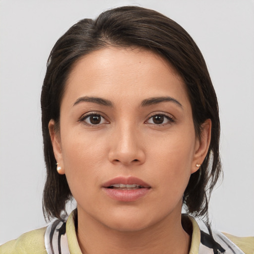 Neutral white young-adult female with medium  brown hair and brown eyes