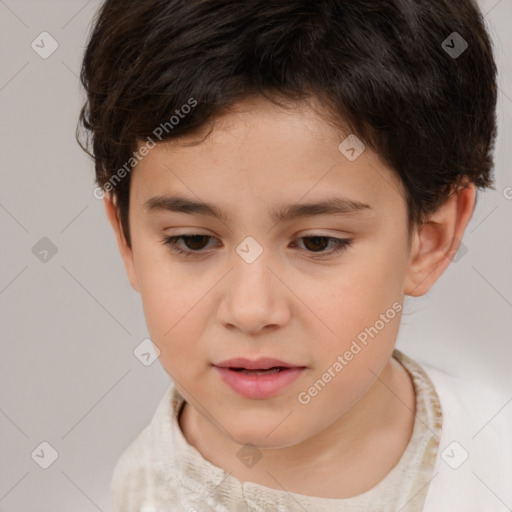 Joyful white child female with short  brown hair and brown eyes