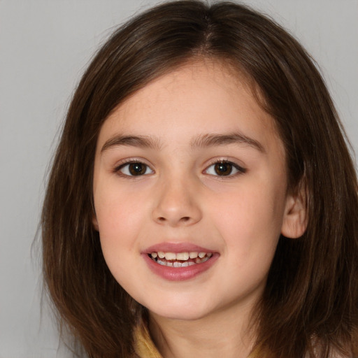 Joyful white child female with medium  brown hair and brown eyes