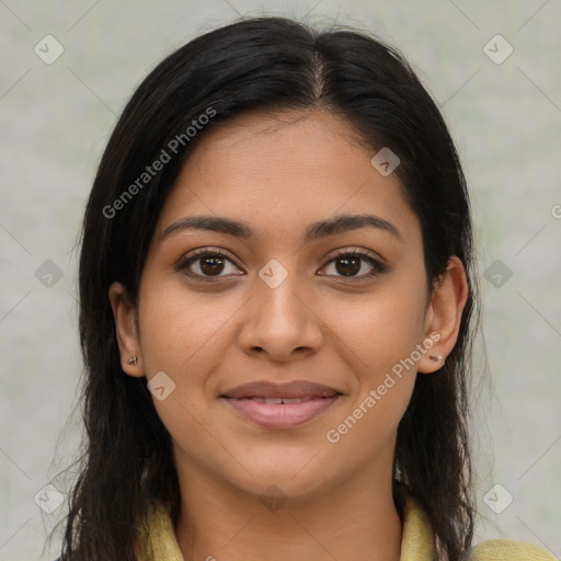 Joyful latino young-adult female with long  brown hair and brown eyes