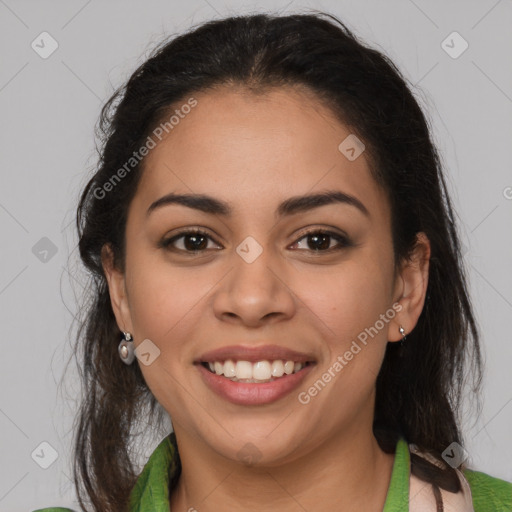 Joyful latino young-adult female with medium  brown hair and brown eyes