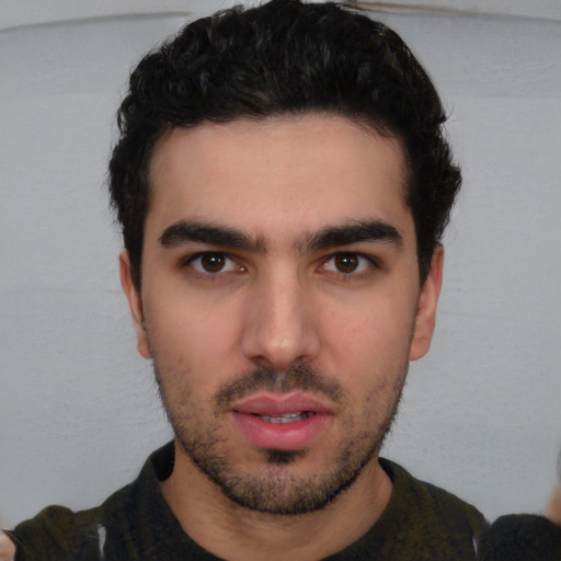 Neutral white young-adult male with short  black hair and brown eyes
