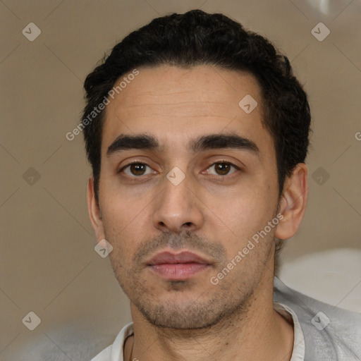 Neutral white young-adult male with short  black hair and brown eyes