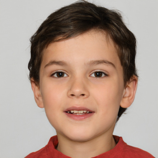 Joyful white child female with short  brown hair and brown eyes