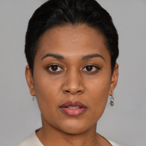 Neutral black young-adult female with short  black hair and brown eyes