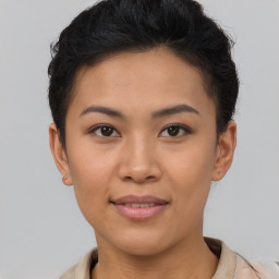 Joyful asian young-adult female with short  brown hair and brown eyes