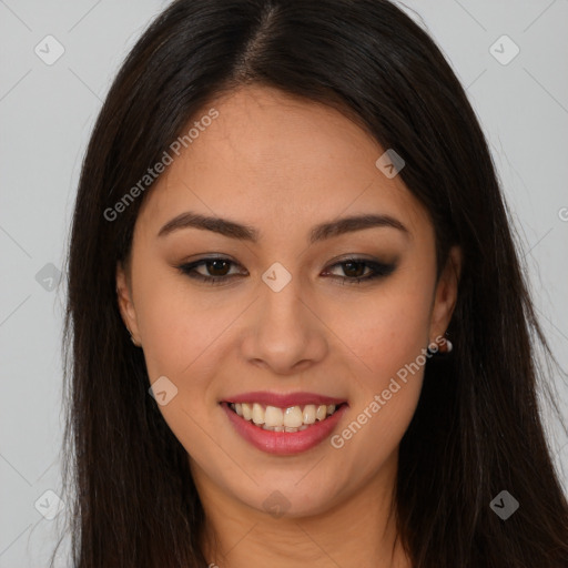 Joyful latino young-adult female with long  brown hair and brown eyes