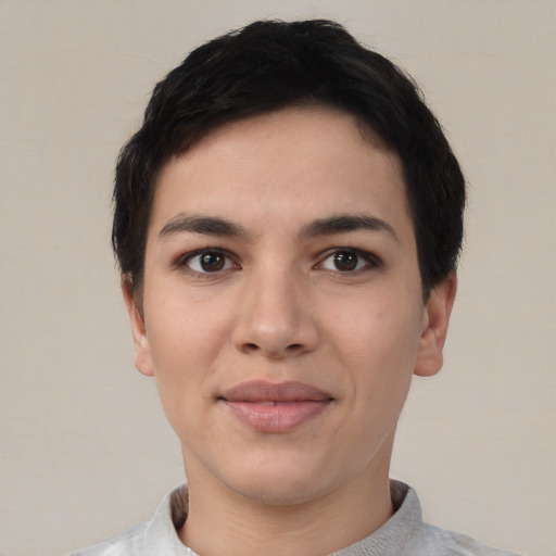 Joyful asian young-adult female with short  black hair and brown eyes