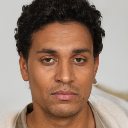 Neutral black young-adult male with short  brown hair and brown eyes