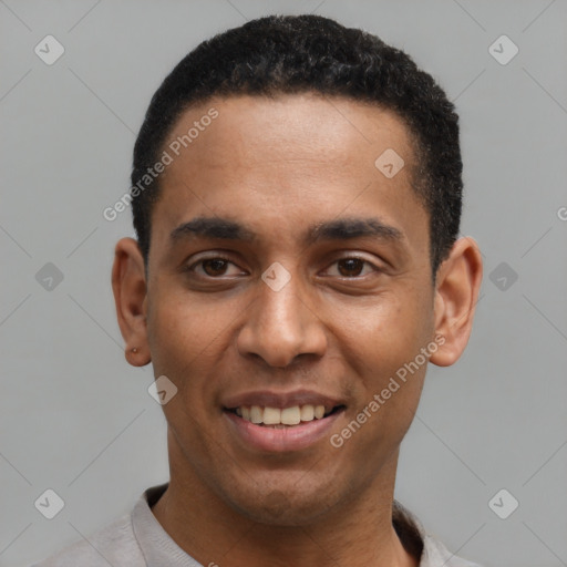 Joyful latino young-adult male with short  black hair and brown eyes