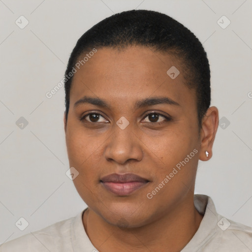 Joyful black young-adult female with short  black hair and brown eyes