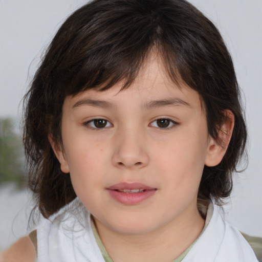 Joyful white child female with medium  brown hair and brown eyes