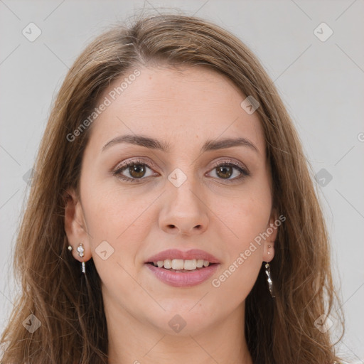 Joyful white young-adult female with long  brown hair and green eyes