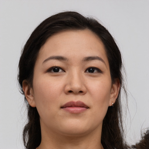 Neutral asian young-adult female with long  brown hair and brown eyes