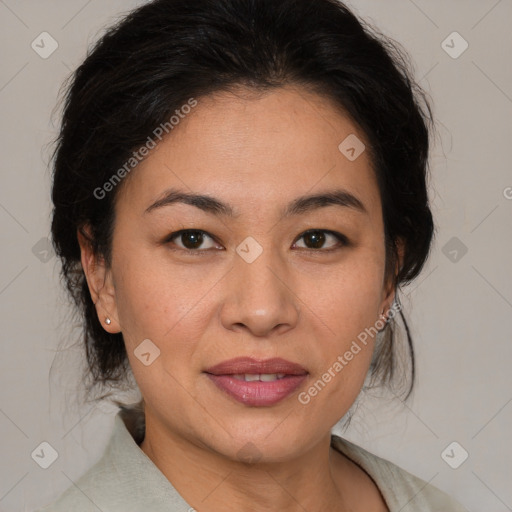 Joyful white adult female with medium  brown hair and brown eyes