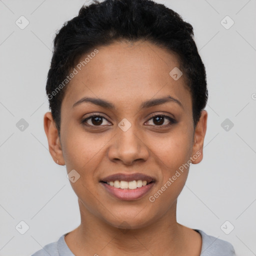 Joyful latino young-adult female with short  black hair and brown eyes