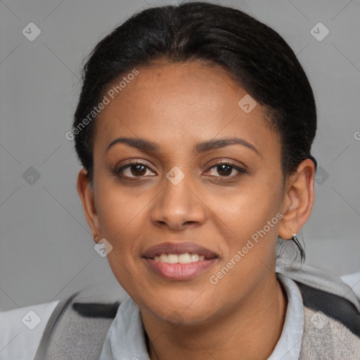 Joyful latino young-adult female with short  black hair and brown eyes